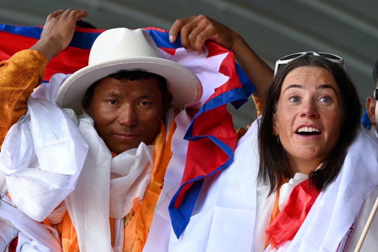 Nepali guide Tenjin Sherpa (pictured with Norwegian climber Kristin Harila) is missing after the avalanche.