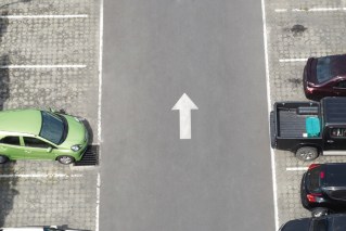 Critics size up plan to lengthen parking spaces