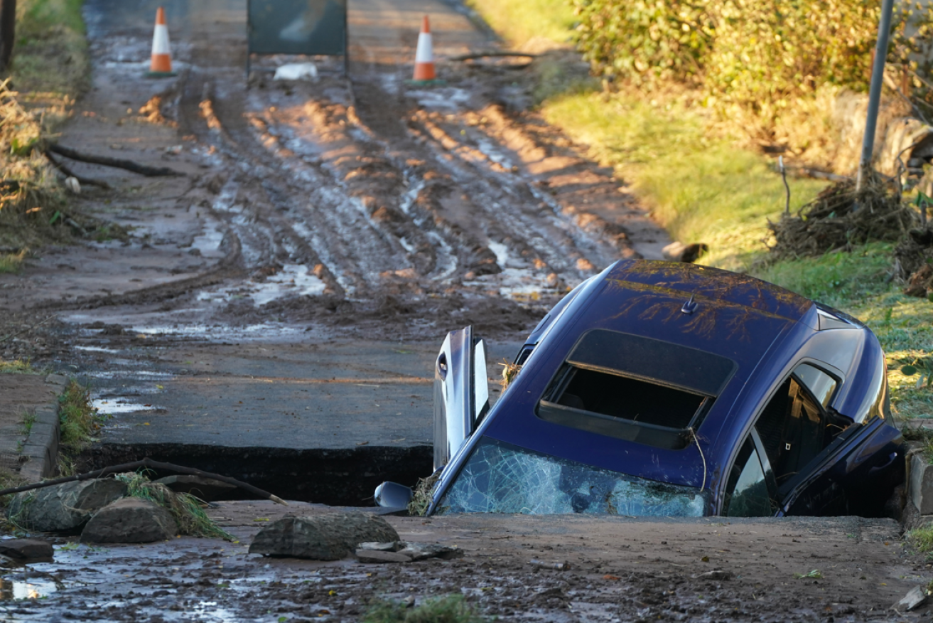 Swept away by torrential rain and raging floods, this wrecked car testifies to the power of the extreme weather event.