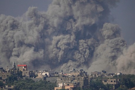 Israel pounds Gaza with air strikes as soldiers skirmish with Hamas