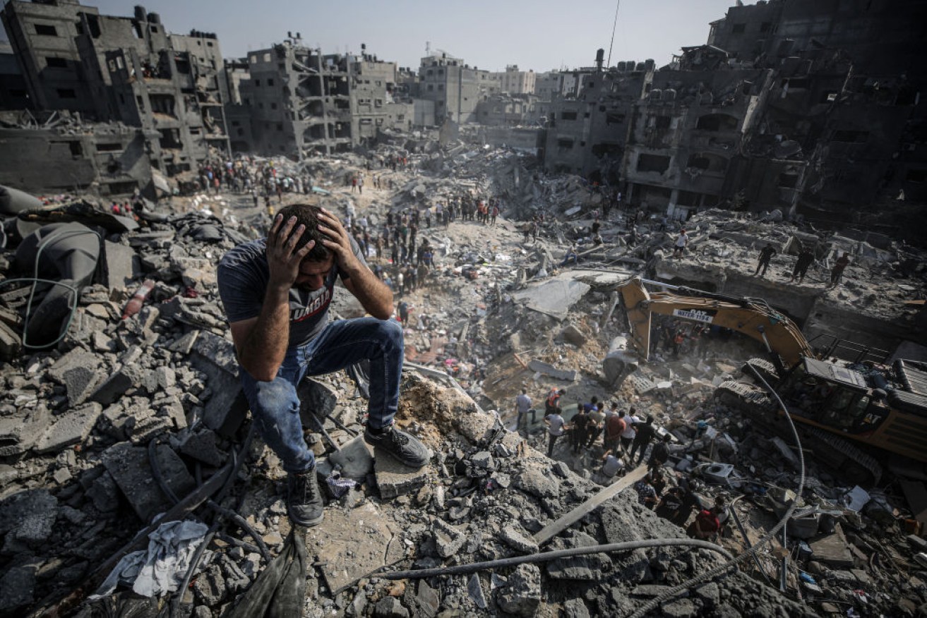 This the hellish landscape of rubble and death the Australians have left behind.