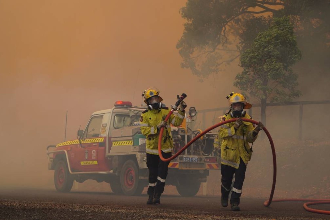 Firefighters are battling blazes threatening residents to the south of Perth.