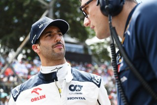 Ricciardo escapes injury after car hit by flying tyre