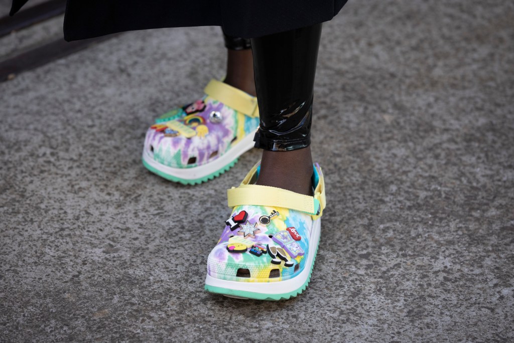 Suzan Mutesi is seen wearing Crocs shoes with Jibbitz charms at Afterpay Australian Fashion Week 2021 on June 1, 2021 in Sydney, Australia