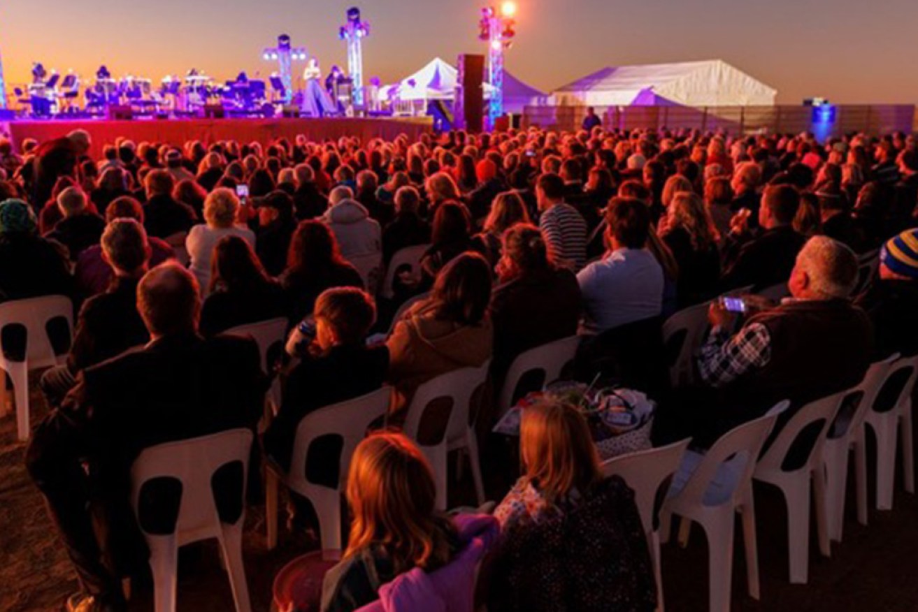 Dazzling night skies, crystal clear air and glorious music ignite audiences at this large-scale outdoor concert. Photo: Opera Queensland
