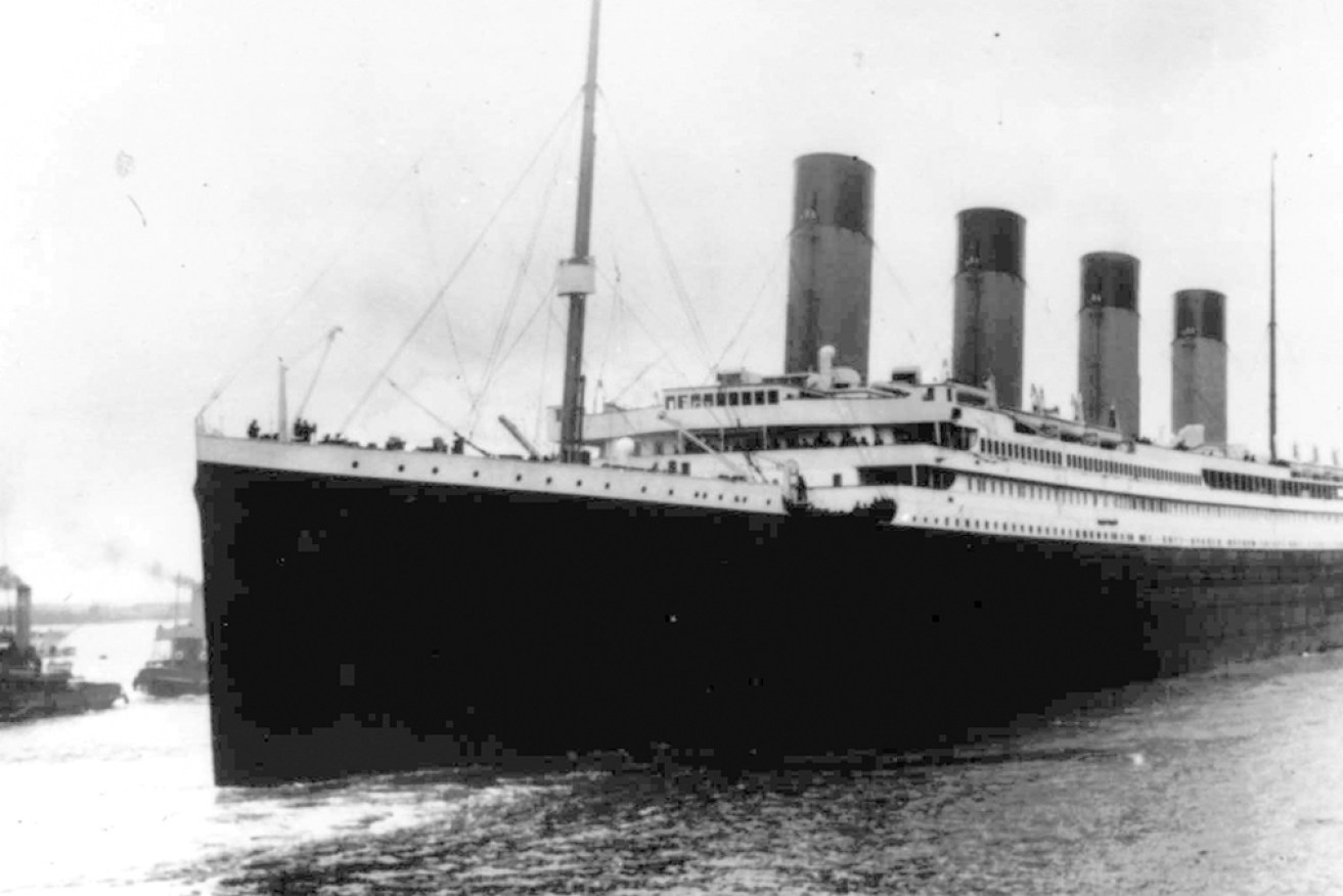 Artefacts from the 1912 Titanic voyage including a menu and a blanket have been sold at auction.