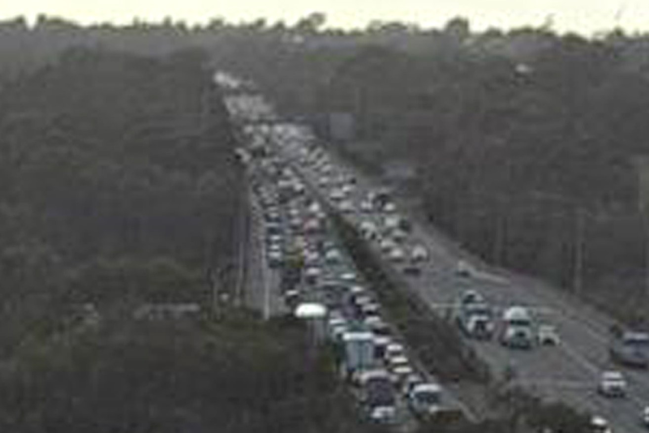 Traffic was backed up for more than 30 kilometres after the flooded tunnel did not reopen.