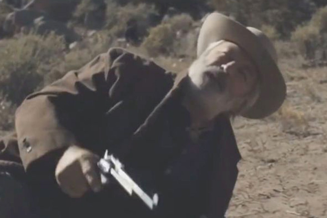 The footage shows Baldwin firing a gun and talking to crew on the set.