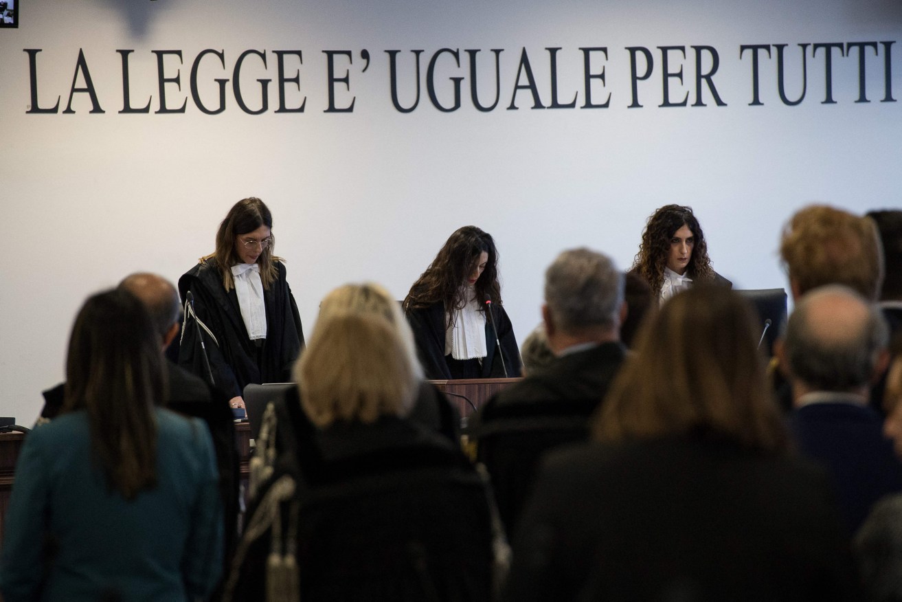 It took more than an hour and 40 minutes for the judge to read aloud the court's lengthy verdict.