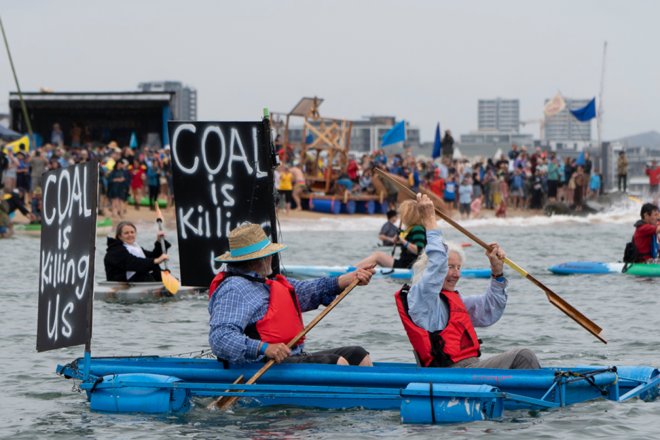 Kayaks, dinghies and sailboats blockaded Newcastle's port. 