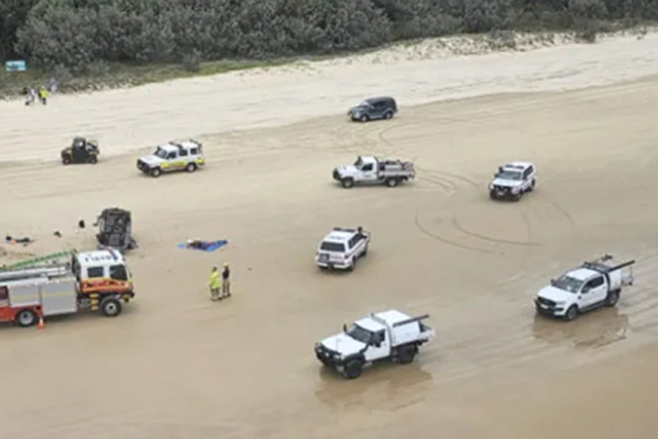 Emergency services on the scene of Monday's fatal beach rollover.