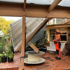 Floodwaters threaten to cut off second coastal town