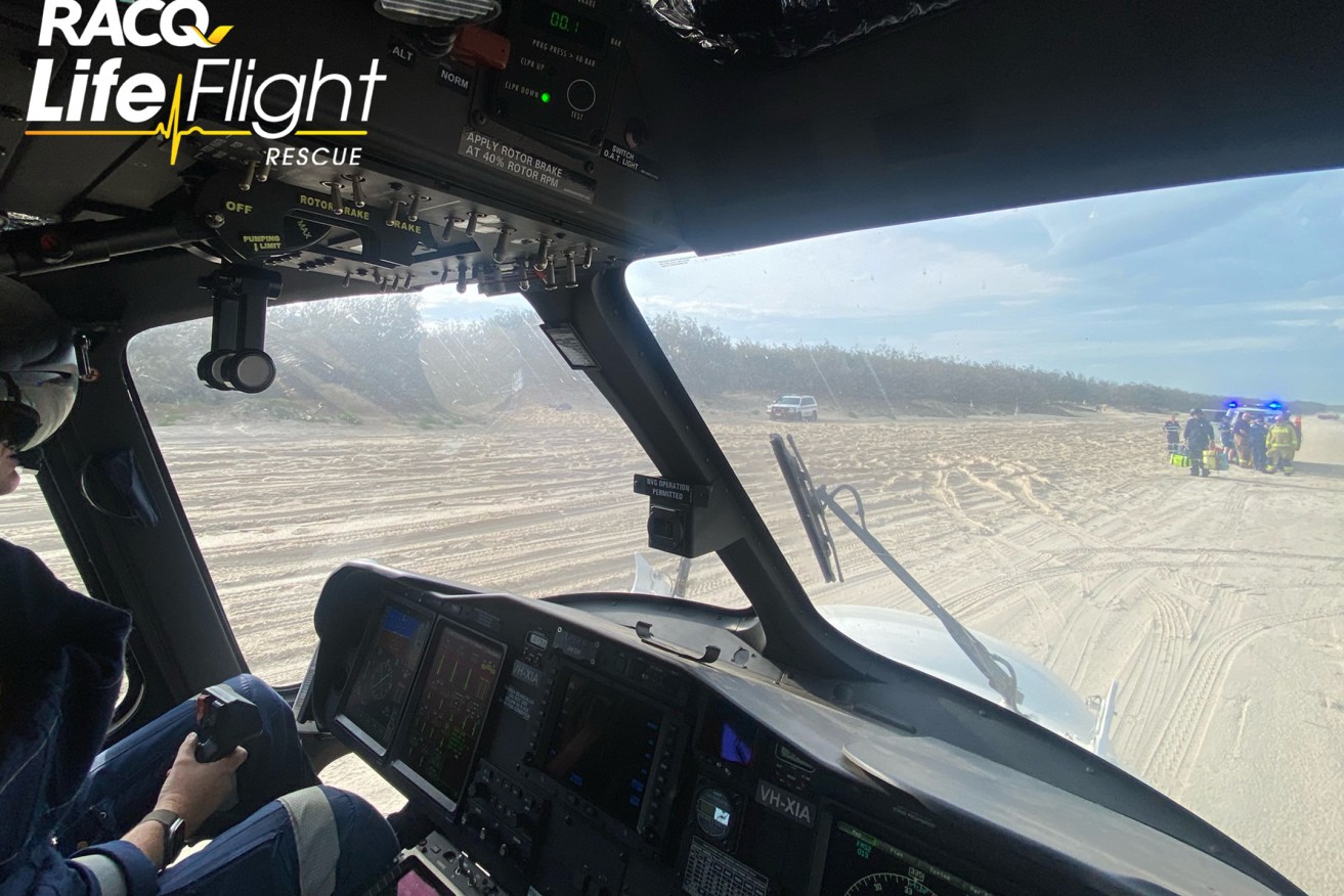 A man has been airlifted to hospital after he was buried in sand on an island in Moreton Bay. 