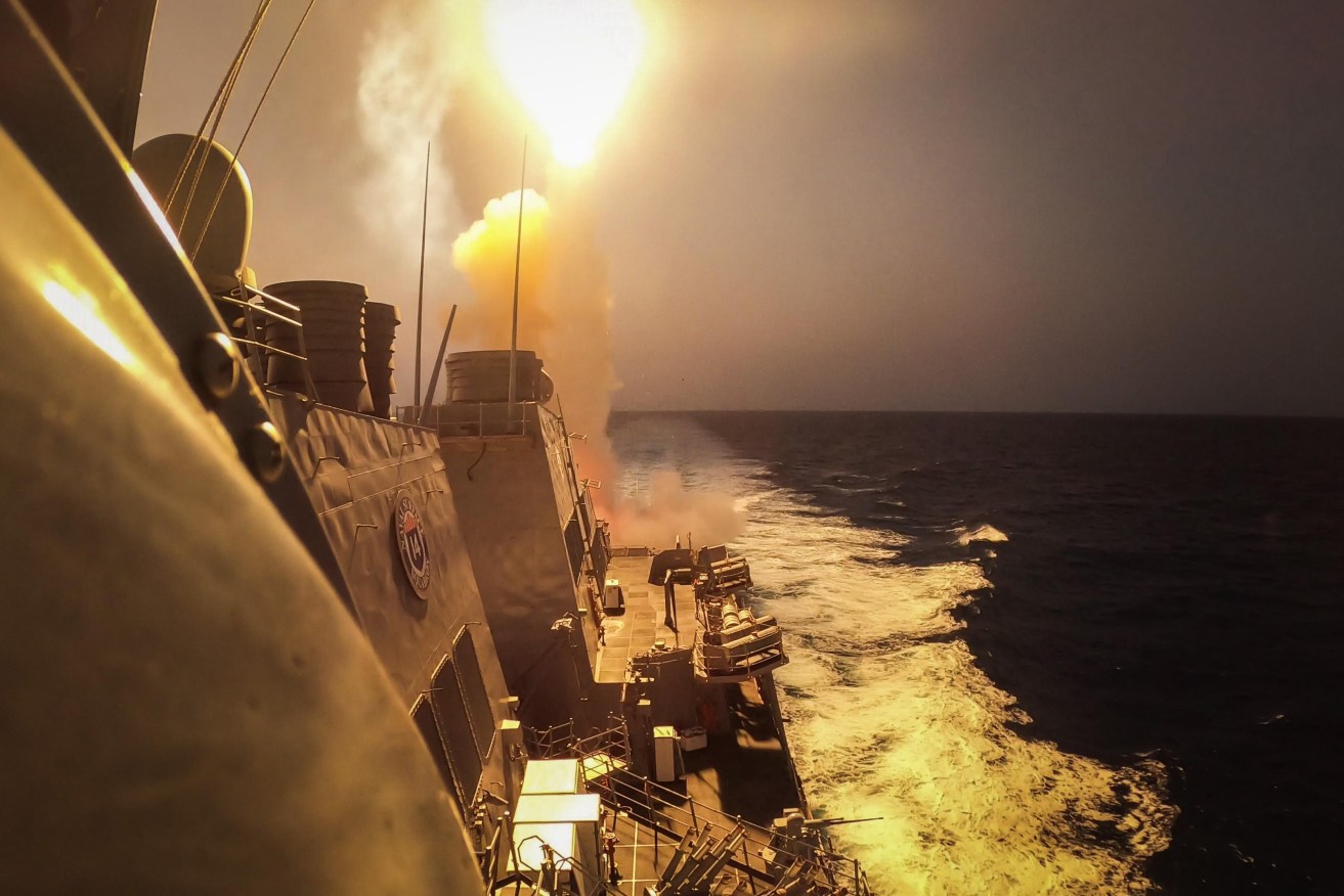 The USS Carney fires at Houthi attackers in the Red Sea in December.