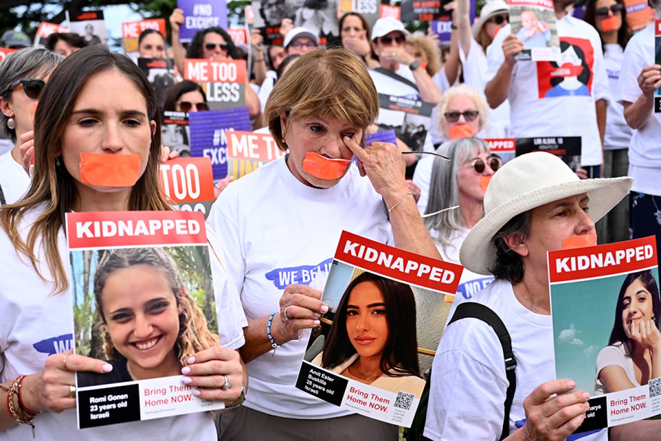A vigil has accused humanitarian groups of failing to condemn sexual violence against Israeli women.