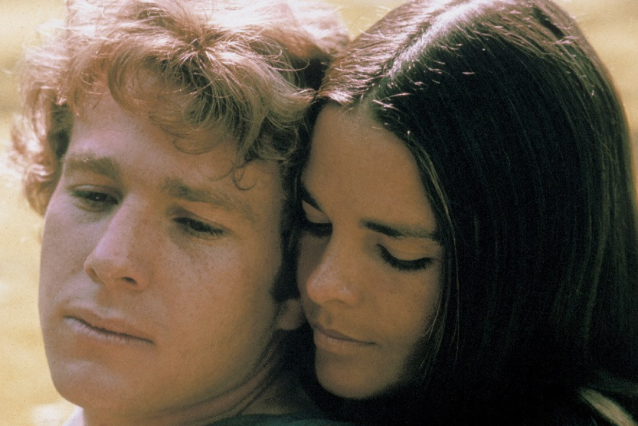 Ryan O'Neal as fans remember him in the box office tear-jerker <i>Love Story</i> with Ali McGraw.