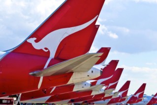Qantas flight lands after engine shut down