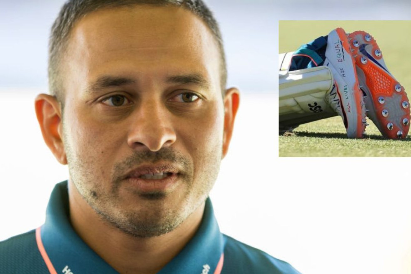 Usman Khawaja's cricket shoes are emblazoned with a call for humanity.