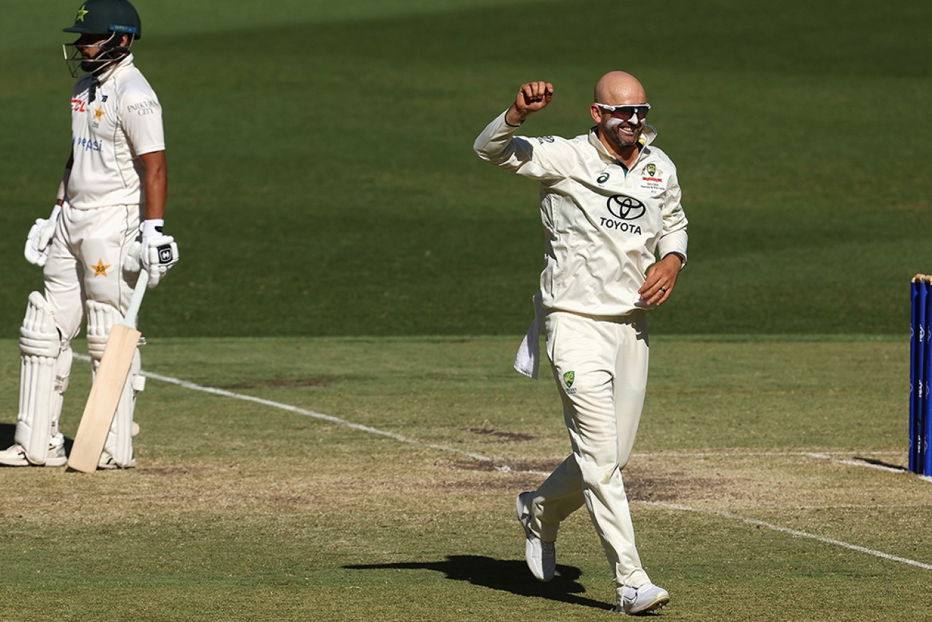 Nathan Lyon has celebrated his 500th Test wicket during Australia's 360-run win against Pakistan.