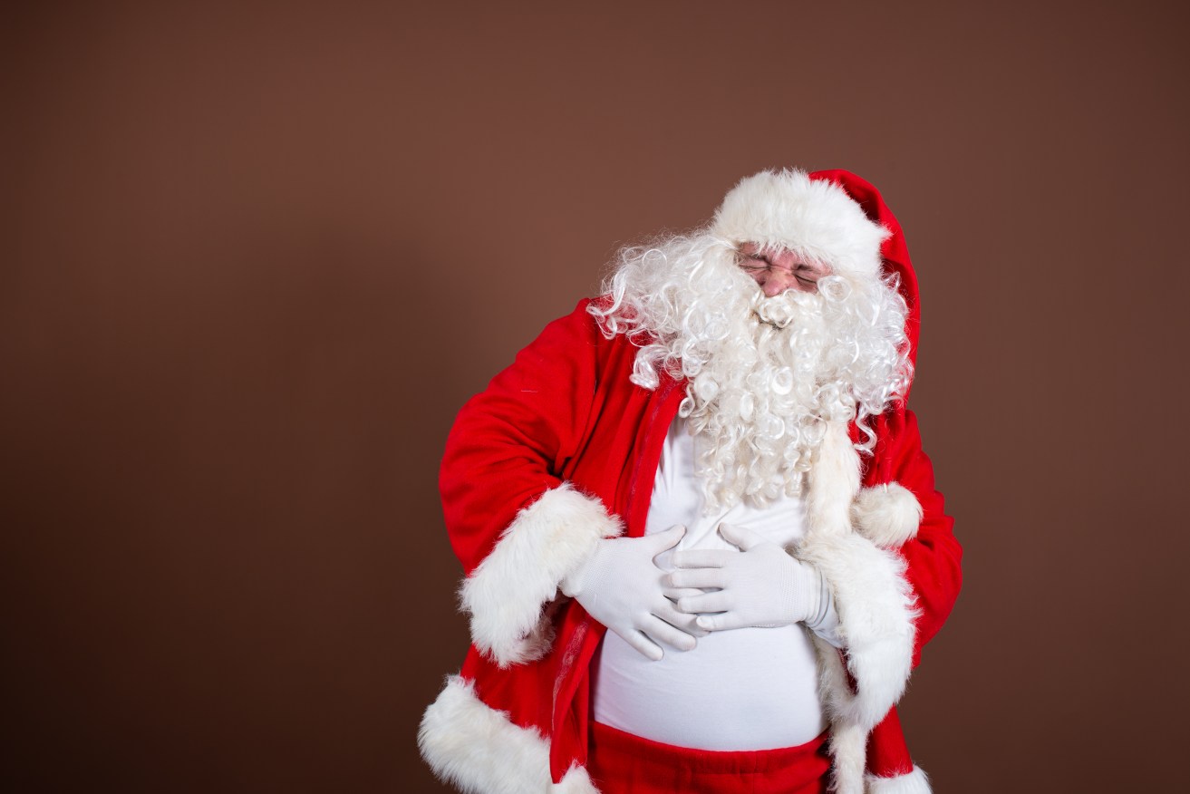 All of that fruit cake and beer left out for Santa isn't doing the old guy much good.