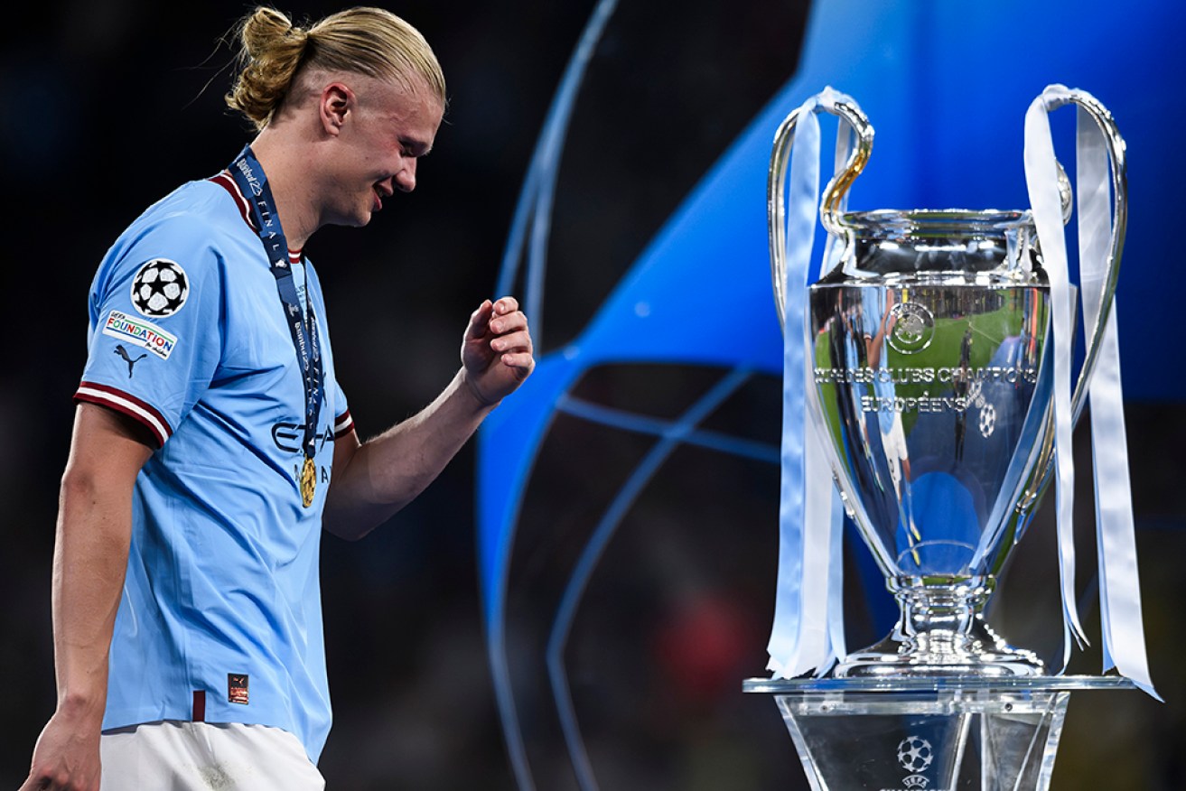 Manchester City’s Erling Haaland with the UEFA Champions League trophy. 
