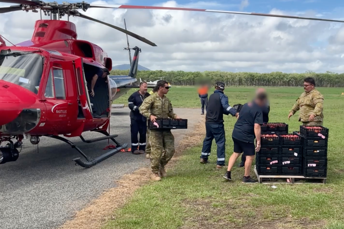 Emergency supplies arrive in Cooktown as the flooding crisis worsens.