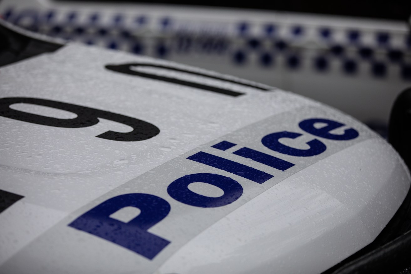 A woman accused of driving off the road with kids in the car has been charged with attempted murder.