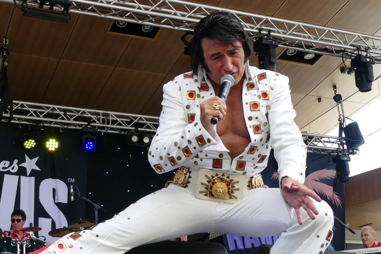 Elvis tribute artist Paul Fenech whips up an adoring crowd in Parkes.