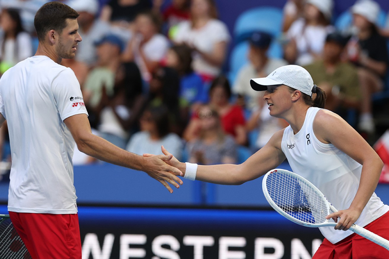 Hubert Hurkacz and Iga Świątek combined for Poland in the mixed doubles to defeat Spain on Monday.