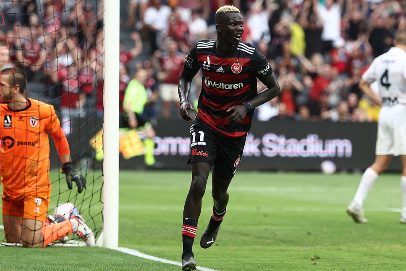 Western Sydney’s Valentino Yuel enjoys his goal at CommBank Stadium on Monday.