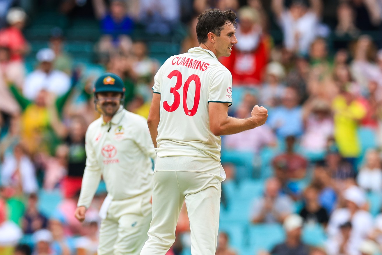 Pat Cummins celebrates his fifth wicket at the SCG on Wednesday. 