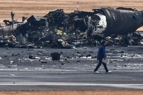 Japan begins twin investigations into Haneda runway collision