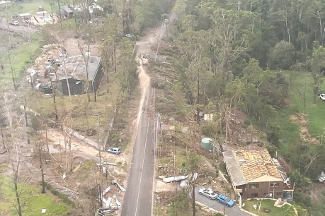 Lights go back on as Qld tots cost of wild storms