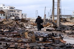 Survivors found as Japan quake toll reaches 100
