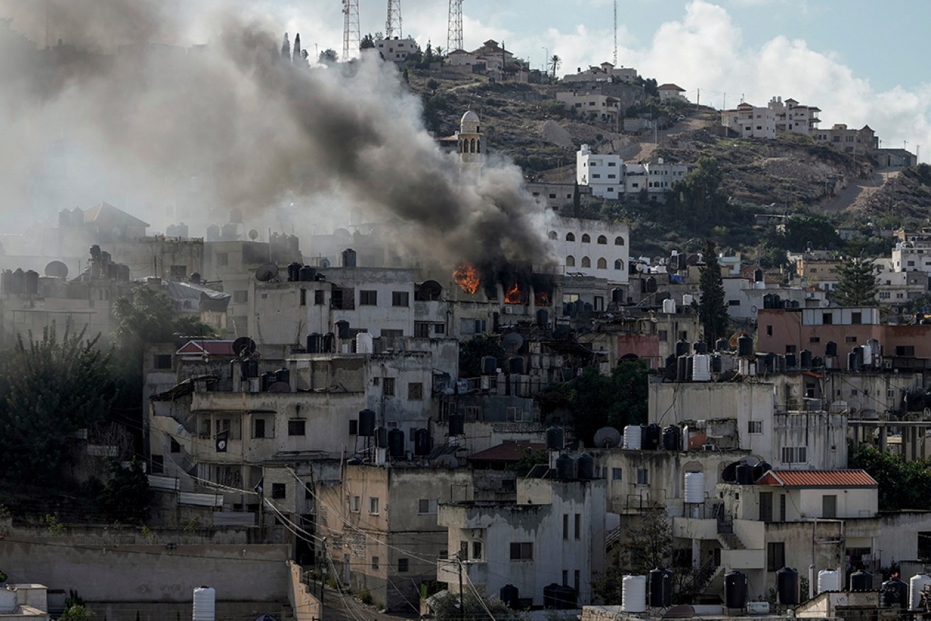 Israel says its aircraft fired on Palestinian militants who had attacked troops in the West Bank.