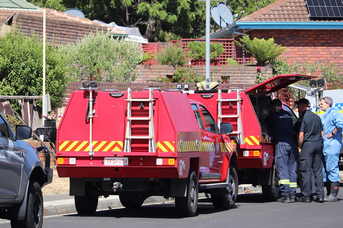 A body was found after emergency services were called to a house fire in Hobart on Friday. 