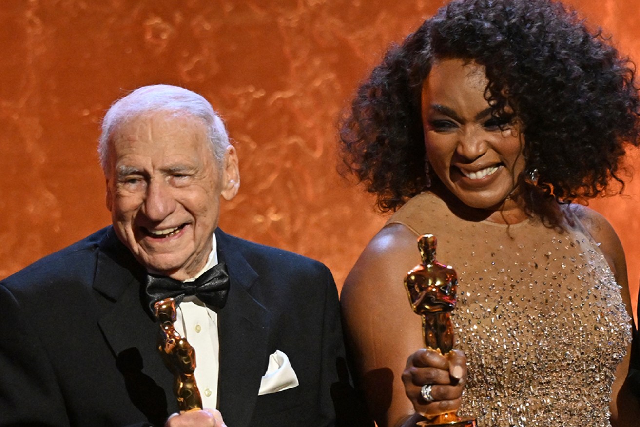 Mel Brooks and Angela Bassett have accepted honorary Oscars at the annual Governors Awards.