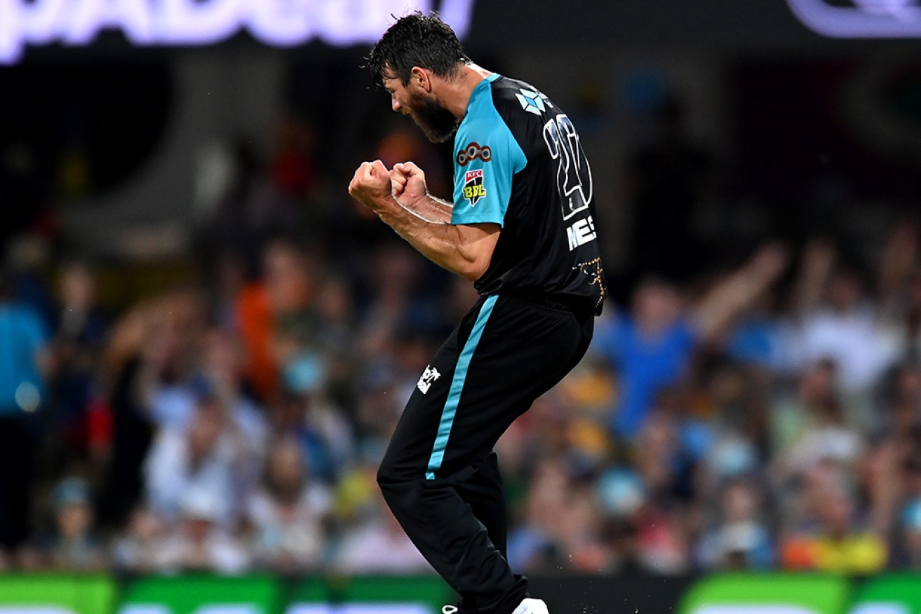 Michael Neser blasted a half-century for Brisbane Heat against Perth Scorchers in the BBL clash at the Gabba.