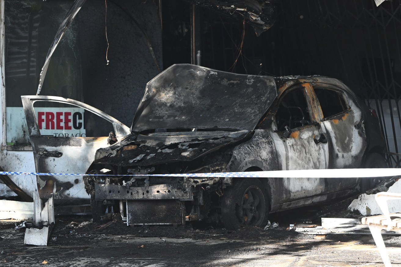 Trio arrested after tobacco shop burns