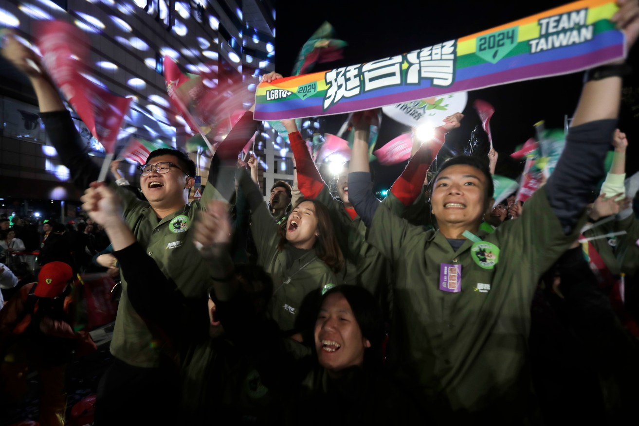 Supporters of Taiwan's presidential election candidate Lai Ching-te celebrate his victory in Taipei.