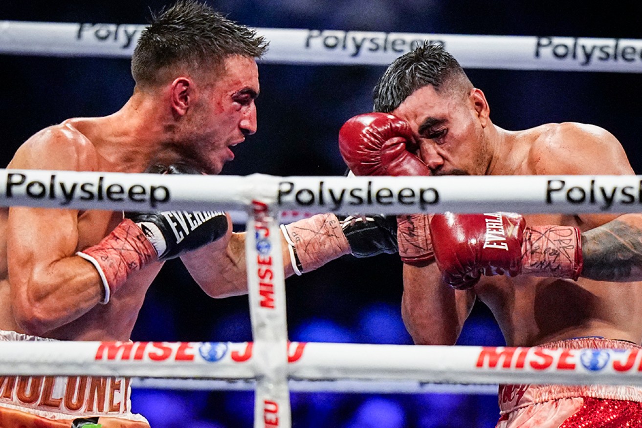 Jason Moloney won a close battle with Mexico's Saul Sanchez to retain his world title on Sunday.