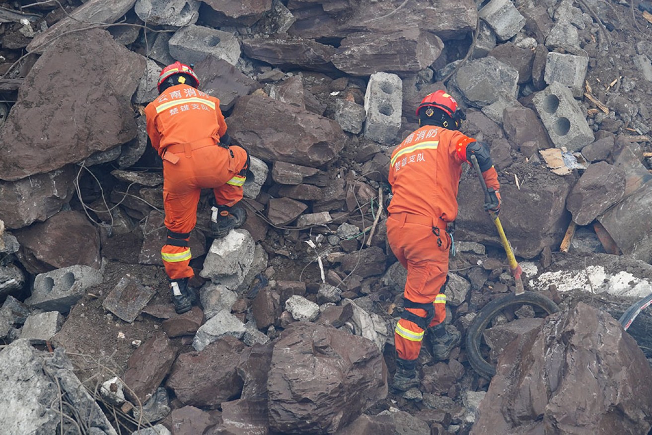 Rescuers are still searching for people missing after a deadly landslide in south-west China.