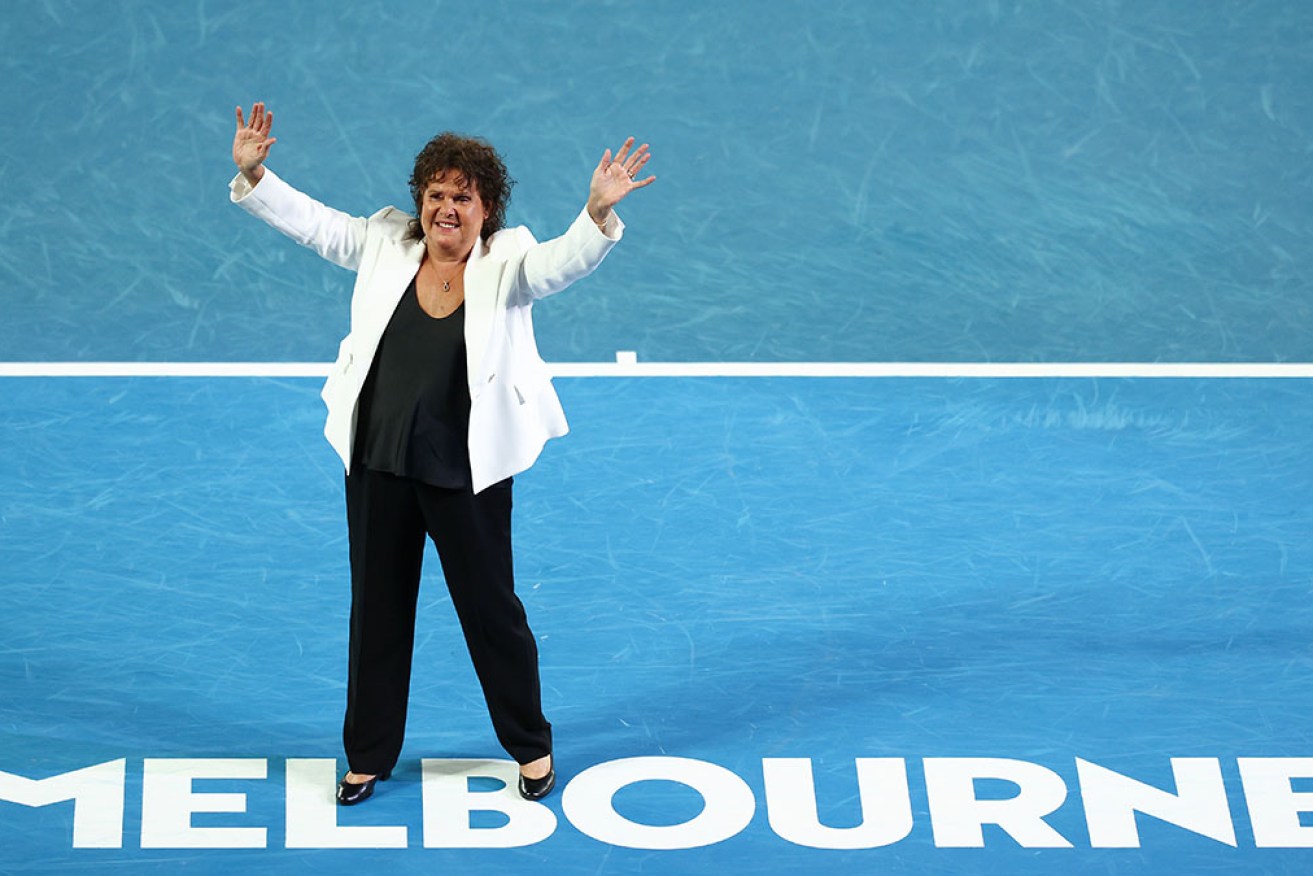 Evonne Goolagong Cawley waves to the crowd on Rod Laver Arena, 50 years after her first AO title. 