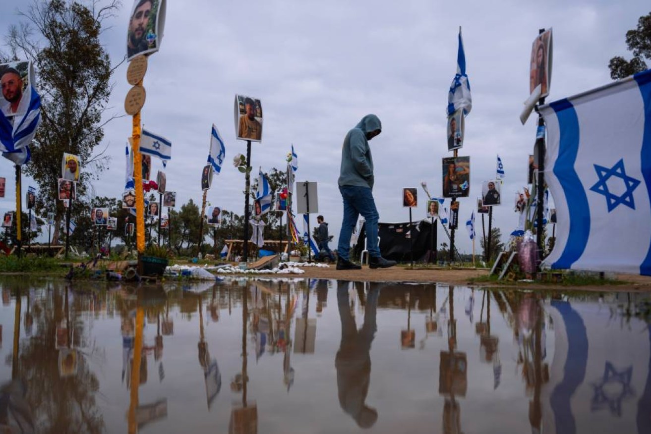 Israelis visit the site where revelers were killed and kidnapped on Oct. 7 cross-border attack by Hamas militants at the Nova music festival near Kibbitz Reim, southern Israel, Friday, Jan. 26, 2024.