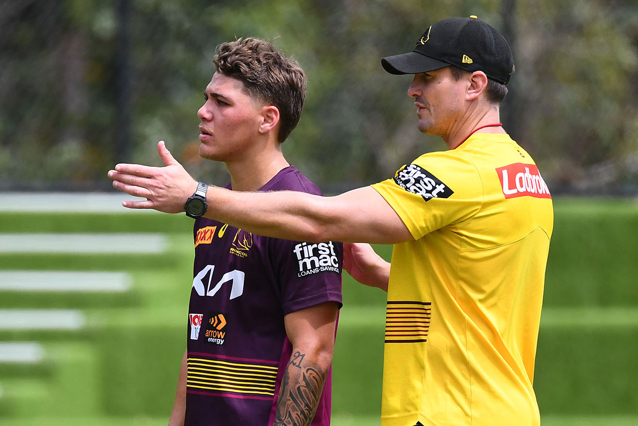 Matt Ballin, pictured with Reece Walsh at Broncos training, is a new assistant coach with Queensland.