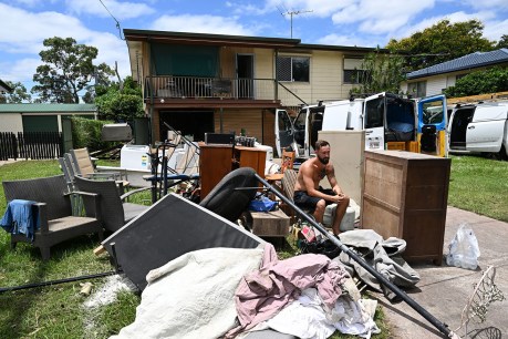 Another cyclone threat looms as flood clean-up begins in Queensland