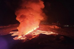 Lava flows as Iceland volcano erupts again