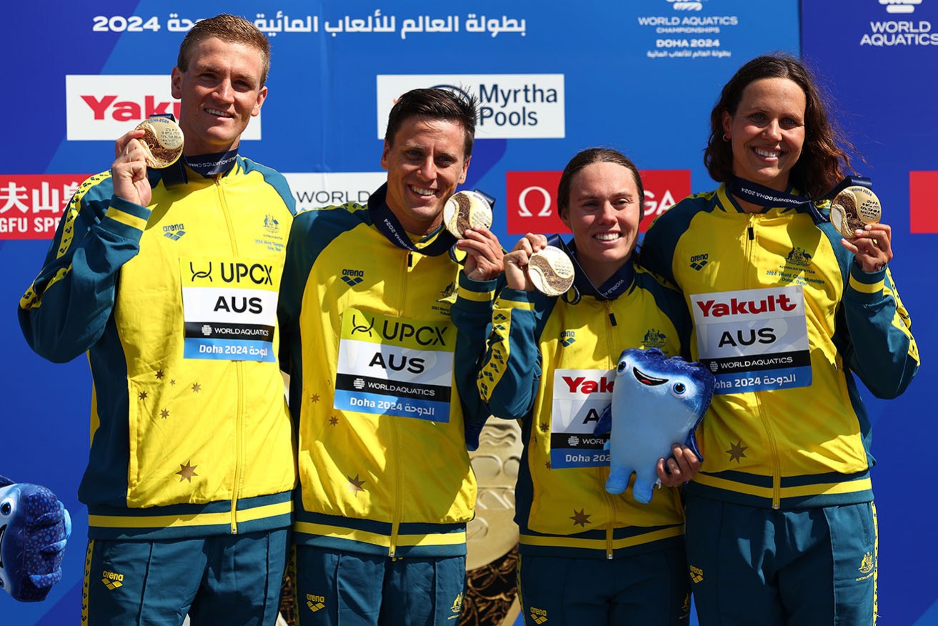 Gold medallists Kyle Lee, Nicholas Sloman, Chelsea Gubecka and Moesha Johnson after the Open Water Mixed Relay 4x1500m in Doha.