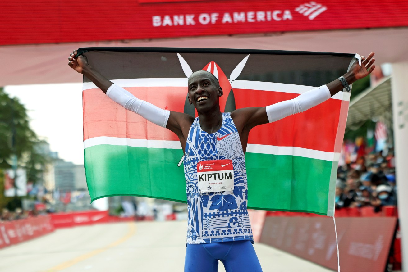 Kenya's Kelvin Kiptum celebrates breaking the world record at the Chicago marathon in October 2023.