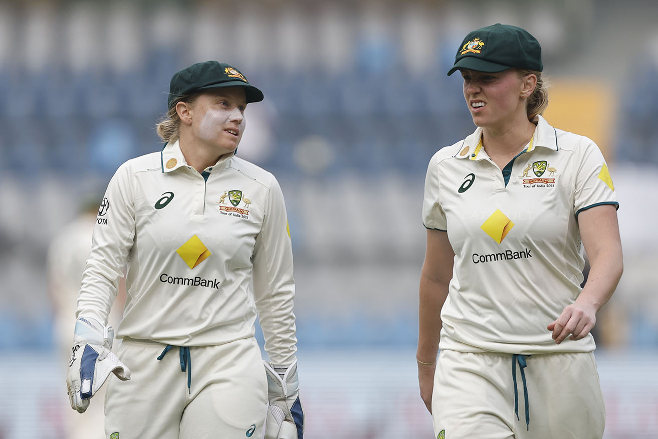 Alyssa Healy, pictured with Kim Garth, is determined for Australia to beat South Africa rather than draw the Perth Test.